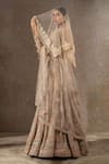 Tarun Tahiliani_Ivory Tulle, Net Embroidery, Sequins, Stones, Zari, Beads, Lehenga And Veil Set _at_Aza_Fashions