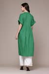 Shop Ritu Kumar Green Cotton Mandarin Collar Vasuki Pleated A-line Calf Length Kurta at Aza Fashions Shop_Ritu Kumar_Green Cotton Mandarin Collar Vasuki Pleated A-line Calf Length Kurta _at_Aza_Fashions