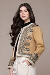 Ritu Kumar Beige Suede Embroidery, Mirrors Round Neck Mavi Quilted Jacket With Fur Trim Online at Aza Fashions Ritu Kumar_Beige Suede Embroidery, Mirrors Round Neck Mavi Quilted Jacket With Fur Trim_Online_at_Aza_Fashions