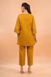 Shop_Naintara Bajaj_Mustard Linen Embroidery Split V-neck Kurta And Pant Set _at_Aza_Fashions