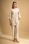 Buy Naintara Bajaj Beige Linen Embroidery Split V-neck Kurta And Pant Set at Aza Fashions Buy_Naintara Bajaj_Beige Linen Embroidery Split V-neck Kurta And Pant Set _at_Aza_Fashions