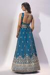 Shop Samyukta Singhania Teal Silk Embroidery, Sequins, Zari V-neck Lehenga Set at Aza Fashions Shop_Samyukta Singhania_Teal Silk Embroidery, Sequins, Zari V-neck Lehenga Set _at_Aza_Fashions