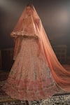 Shop_House of ayra_Peach Silk, Net Embroidery, Zari, Mirrors, Flora Thread Bridal Lehenga Set _at_Aza_Fashions