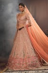 Shop_House of ayra_Peach Silk, Net Embroidery, Zari, Mirrors, Flora Thread Bridal Lehenga Set _Online_at_Aza_Fashions