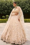 Shop House of ayra Ivory Net Embroidery, Sequins, Stones, Metallic Snow White Bridal Lehenga Set at Aza Fashions Shop_House of ayra_Ivory Net Embroidery, Sequins, Stones, Metallic Snow White Bridal Lehenga Set _at_Aza_Fashions