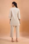 Shop Naintara Bajaj Beige Linen Embroidery Split V-neck, Mandarin Collar Kurta And Pant Set at Aza Fashions Shop_Naintara Bajaj_Beige Linen Embroidery Split V-neck, Mandarin Collar Kurta And Pant Set _at_Aza_Fashions