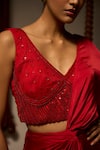 Shop_Saangi_Red Modal, Satin Sequins, Knotted Draped Saree Skirt With Embellished Blouse _at_Aza_Fashions