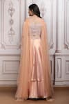 Shop_Mandira Wirk Resort_Peach Satin, Lurex, Georgette Sequins, Beads, Embellished Blouse Lehenga Set _at_Aza_Fashions