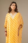 Samyukta Singhania_Yellow Organza, Shantoon Mirrors, Zari V-neck Leheriya Pattern Kaftan And Pant Set _Online_at_Aza_Fashions