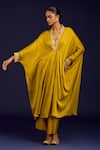 Devnaagri_Mustard Modal, Satin Embroidery, Mirrors, Sequins V-neck Dori Kaftan And Pant Set _at_Aza_Fashions