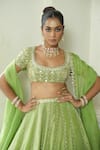 Enamour By Radha_Green Organza Sequins, Pearls, Mirrors, Beads, Zari, Embroidery Lehenga Set _at_Aza_Fashions