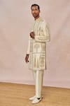 Masaba Ivory Silk, Dupion Embroidery, Tere Peeche Chala Aaya Embellished Sherwani Set Online at Aza Fashions Masaba_Ivory Silk, Dupion Embroidery, Tere Peeche Chala Aaya Embellished Sherwani Set _Online_at_Aza_Fashions