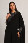 Namrata Joshipura_Black Jersey Sequins Round Neck Intricate Amara Draped Jumpsuit _Online_at_Aza_Fashions