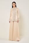 Buy_Namrata Joshipura_Ivory Embroidery, Sequins, Beads Round Neck Amara Peplum Top With Sharara Pant _at_Aza_Fashions