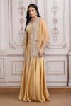 Mandira Wirk Resort_Gold Lurex, Georgette Sequins, Pearls, Beads Embroidered Jacket Skirt Set _at_Aza_Fashions