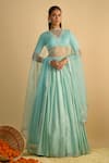 Buy_RAYASHA KHAN_Blue Silk, Net Cut Work V-neck Bluebells Crystal Chiffon Lehenga Set _at_Aza_Fashions