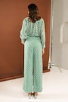 Shop_Ria Shah Label_Green Georgette Mirrors V-neck Shibori Print Ruffled Top And Wide Legged Pant Set _at_Aza_Fashions