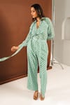 Buy_Ria Shah Label_Green Georgette Mirrors V-neck Shibori Print Ruffled Top And Wide Legged Pant Set _Online_at_Aza_Fashions