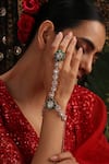 Buy_Swabhimann_Green Stones, Faux Diamonds Polki Embellished Hathphool _at_Aza_Fashions