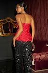 Shop Dash And Dot Red Polyester, Viscose Sequins Bandeau Embroidered Corset And Paillette Pant Set at Aza Fashions Shop_Dash And Dot_Red Polyester, Viscose Sequins Bandeau Embroidered Corset And Paillette Pant Set _at_Aza_Fashions
