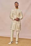 Buy Masaba Ivory Silk, Dupion Embroidery, Tere Peeche Chala Aaya Embellished Sherwani Set at Aza Fashions Buy_Masaba_Ivory Silk, Dupion Embroidery, Tere Peeche Chala Aaya Embellished Sherwani Set _at_Aza_Fashions
