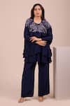 Shop Myra Clothing Line Navy Crepe Embroidery, Sequins, Beads, Stones Round Neck Ruffled Top And Pant Set at Aza Fashions Shop_Myra Clothing Line_Navy Crepe Embroidery, Sequins, Beads, Stones Round Neck Ruffled Top And Pant Set _at_Aza_Fashions