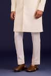 Shop_Devnaagri_Ivory Cotton, Silk, Lycra Embroidery Pintuck Pattern Sherwani And Pant Set _Online_at_Aza_Fashions