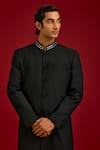 Devnaagri_Black Cotton, Silk, Lycra Pintuck Pattern Sherwani And Pant Set _at_Aza_Fashions