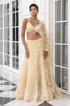 Buy House Of Armuse Yellow Tissue, Organza Embroidery, Beads, Chains, Metallic Ivory Lehenga Set at Aza Fashions Buy_House Of Armuse_Yellow Tissue, Organza Embroidery, Beads, Chains, Metallic Ivory Lehenga Set _at_Aza_Fashions