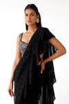 Basanti - Kapde Aur Koffee Black Lycra Stones, Beads, Ruffles Pre-draped Saree With Embroidered Blouse at Aza Fashions Basanti - Kapde Aur Koffee_Black Lycra Stones, Beads, Ruffles Pre-draped Saree With Embroidered Blouse_at_Aza_Fashions