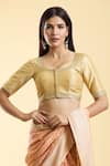 Samyukta Singhania_Gold Silk Embroidery Round Neck Ditsy Blossom Blouse _at_Aza_Fashions
