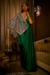 Babita Malkani_Emerald Green Satin, Net Crystals, Draped Saree Gown With Embroidered Tulle Cape _Online_at_Aza_Fashions