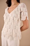 Shriya Som_Ivory Chiffon Fringe, Beads, Lace, Ruffles Scallop Top And Godet Pant Set _Online_at_Aza_Fashions