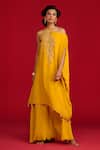 Buy_Megha Pitti_Yellow Crepe Embroidery, Sequins, Tassels Pita And Hand Kurta & Flared Pant Set _at_Aza_Fashions