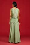 Shop_Megha Pitti_Green Silk, Organza Sequins, Tassels Round Embroidered Crop Top With Flared Pant _at_Aza_Fashions