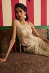 Shop_Megha Pitti_Ivory Modal, Satin, Crepe Sequins, Zari, Embroidery Corset Draped Skirt Set _at_Aza_Fashions