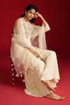 Megha Pitti_Ivory Crepe, Organza Embroidery, Sequins, Zari, Tassels Hand Kurta Gharara Set _at_Aza_Fashions