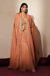 Buy_ISHA GUPTA TAYAL_Peach Silk Embroidery, Stones, Patchwork V-neck, Open Morni Cape Sharara Set _at_Aza_Fashions