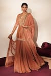 ISHA GUPTA TAYAL_Peach Silk Embroidery, Stones, Cut Work, Tassels Mrinalika Kurta Sharara Set _Online_at_Aza_Fashions