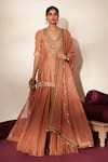 Buy_ISHA GUPTA TAYAL_Peach Silk Embroidery, Stones, Cut Work, Tassels Mrinalika Kurta Sharara Set _at_Aza_Fashions