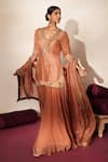 Buy_ISHA GUPTA TAYAL_Peach Silk Embroidery, Stones, Cut Work, Tassels Mrinalika Kurta Sharara Set _Online_at_Aza_Fashions