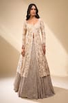Seema Gujral_Beige Net Pearls, Embroidery, Zari V-neck Jacket Lehenga Set _Online_at_Aza_Fashions