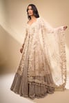 Shop_Seema Gujral_Beige Net Pearls, Embroidery, Zari V-neck Jacket Lehenga Set _Online_at_Aza_Fashions