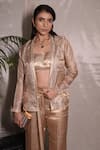 Shop_Vedangi Agarwal_Gold Tissue Zari, Sequins Open Neck, Square Solar Radiance Jacket And Pant Set _at_Aza_Fashions