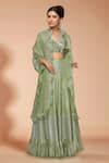 Buy Neha Khullar Green Silk, Organza V Neck Embroidered Lehenga Set at Aza Fashions Buy_Neha Khullar_Green Silk, Organza V Neck Embroidered Lehenga Set _at_Aza_Fashions