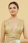 Buy_Samyukta Singhania_Gold Silk Gota Patti V-neck Floral Pattern Embroidered Blouse _at_Aza_Fashions