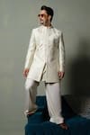 Buy_Runit Gupta_Ivory Silk Piping Dusty Flap Sherwani Set _at_Aza_Fashions