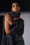 Nikita Mhaisalkar_Navy Knit, Cotton Metallic Thread, Zari One Shoulder Jumper And Skirt Set _at_Aza_Fashions