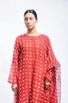 JAYATI GOENKA_Red Chanderi Silk Smocking Round Neck Block Printed Kurta Set _at_Aza_Fashions