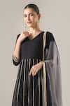 Naintara Bajaj Black Cotton Gota Patti V-neck Work Peplum Kurta And Tiered Sharara Set Online at Aza Fashions Naintara Bajaj_Black Cotton Gota Patti V-neck Work Peplum Kurta And Tiered Sharara Set _Online_at_Aza_Fashions